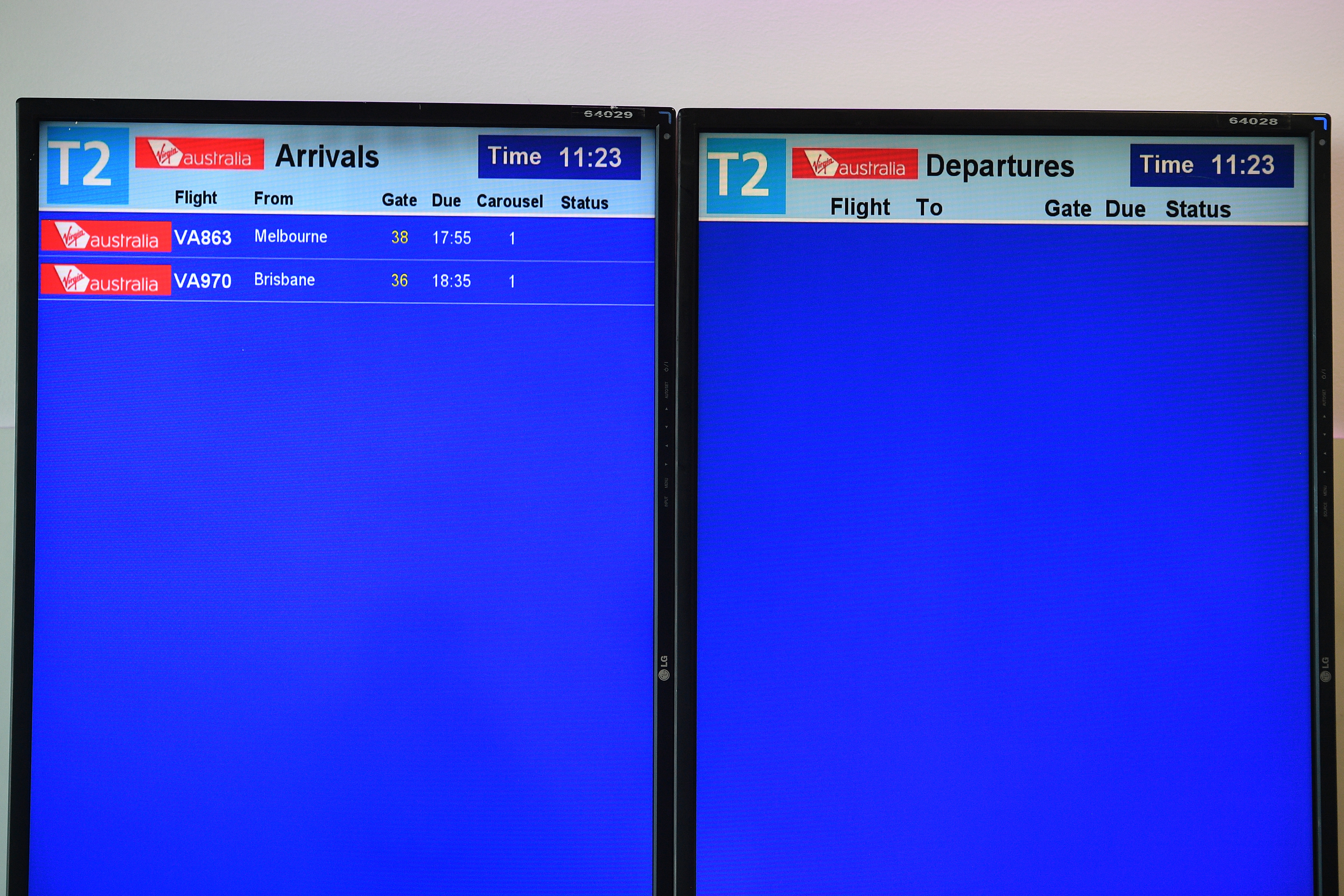 بوابات الصعود إلى الطائرة فيرجن أستراليا فارغة في مطار سيدني المحلي في أبريل.
