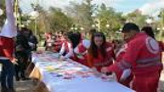 عضوات الهلال الأحمر ينهون فعاليات العنف ضد المرأة بطباعة أكفهن