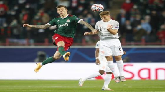 Soccer Football - Champions League - Group A - Lokomotiv Moscow v Bayern Munich - RZD Arena, Moscow, Russia - October 27, 2020 Lokomotiv Moscow's Fyodor Smolov in action with Bayern Munich's Joshua Kimmich Pool via REUTERS/Maxim Shemetov