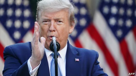 US President Donald Trump gestures as he speaks during the daily briefing on the novel coronavirus, which causes COVID-19, in the Rose Garden of the White House on April 15, 2020, in Washington, DC. (Photo by MANDEL NGAN / AFP)