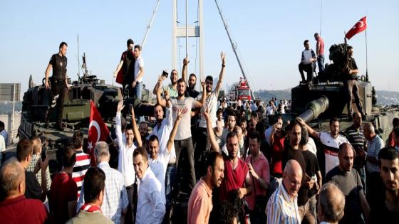 ISTANBUL, TURKEY - JULY 16: Turkish people are seen after a group of soldiers with armored vehicle, involved in "Parallel State/Gulenist Terrorist Organization"s coup attempt, are being neutralized by police at Bosphorus Bridge in Istanbul, Turkey on July 16, 2016 while people are reacting against military coup attempt. Parallel state is an illegal organization backed by U.S.-based preacher Fetullah Gulen. (Photo by Elif Ozturk/Anadolu Agency/Getty Images)